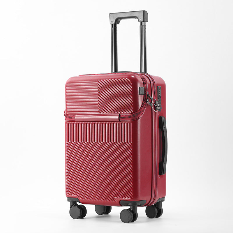 Red hard-shell carry-on at an angle with the pull handle extended and spinner wheels visible